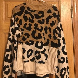 Animal print two toned turtleneck sweater
